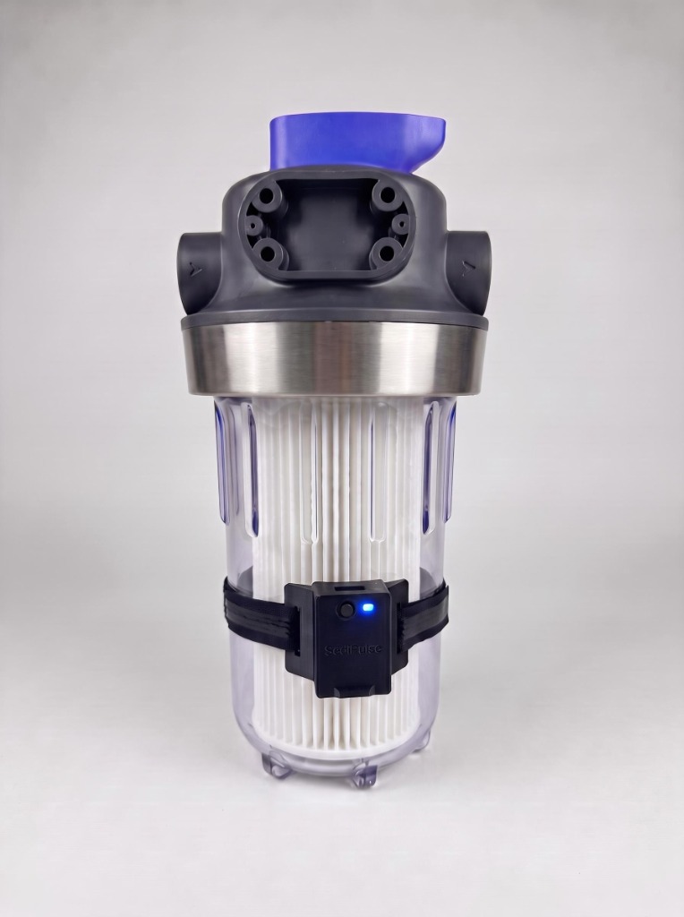 SediPulse Smart Whole-House Sediment Filter Monitor mounted on clear water filter canister